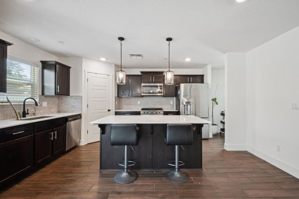 Interior, Kitchen, Pendant Lights, Recessed Lighting, Stainless Steel Appliances, Wood Texture Flooring
