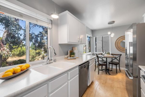 Dining room, Interior, Kitchen, Pendant Lights, Stainless Steel Appliances, Wood Texture Flooring