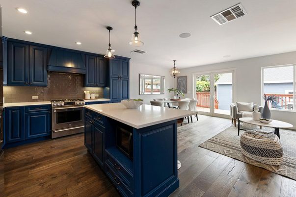 Chandelier, Dining room, Interior, Kitchen, Living room, Pendant Lights, Recessed Lighting, Stainless Steel Appliances, Wood Texture Flooring