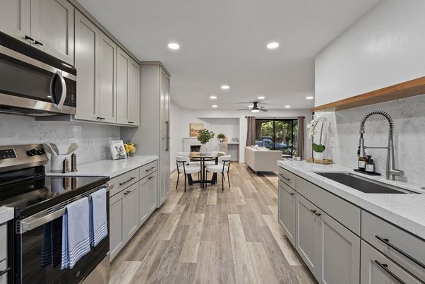 Dining room, Interior, Kitchen, Recessed Lighting, Stainless Steel Appliances, Wood Texture Flooring