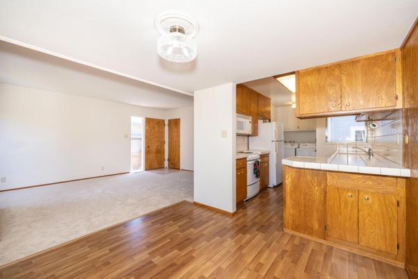 Interior, Kitchen, Tile Countertops, Wood Texture Flooring