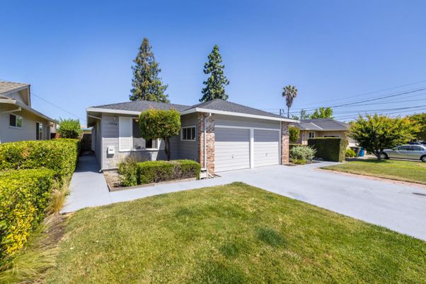 Attached, Backyard, Exterior, Facade, Brick Facade, Ranch