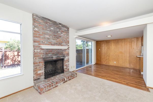 Empty room, Fireplace, Interior, Recessed Lighting, Stone Walls, Wood Texture Flooring