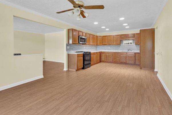 Interior, Kitchen, Recessed Lighting, Stainless Steel Appliances, Wood Texture Flooring