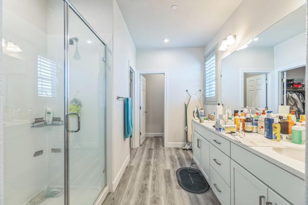 Bathroom, Dual Sink Vanities, Glass Shower, Interior, Recessed Lighting, Wood Texture Flooring