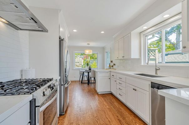 Dining room, Interior, Kitchen, Pendant Lights, Recessed Lighting, Stainless Steel Appliances, Wood Texture Flooring