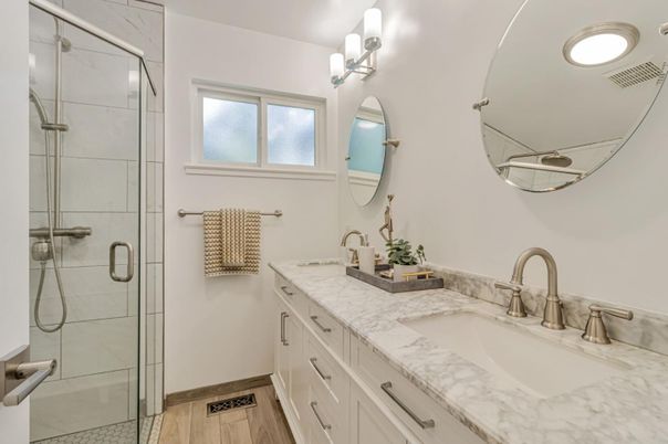 Bathroom, Dual Sink Vanities, Glass Shower, Interior, Wood Texture Flooring