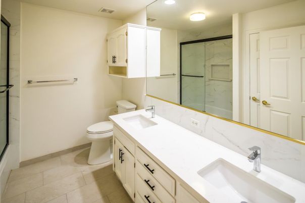 Bathroom, Dual Sink Vanities, Glass Shower, Interior, Marble Walls, Recessed Lighting
