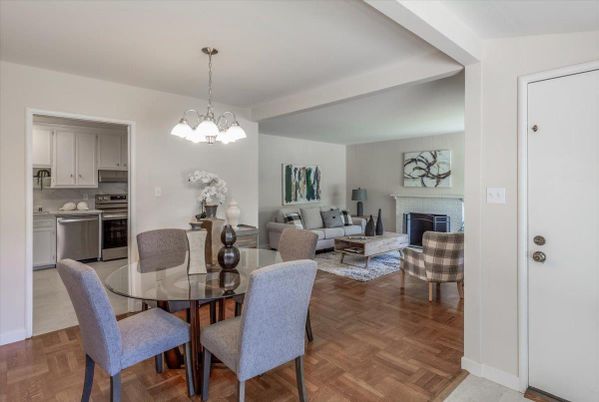 Dining room, Fireplace, Interior, Kitchen, Living room, Pendant Lights, Stainless Steel Appliances, Wood Texture Flooring