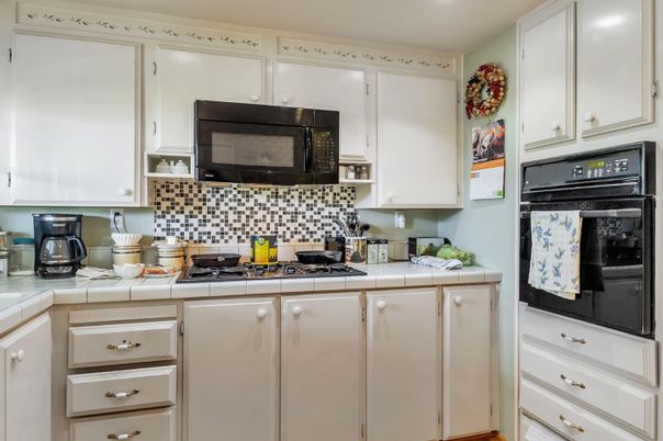 Interior, Kitchen, Recessed Lighting, Tile Countertops