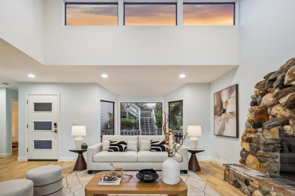 Fireplace, Interior, Living room, Recessed Lighting, Stone Walls, Wood Texture Flooring