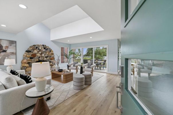 Fireplace, Interior, Living room, Recessed Lighting, Stone Walls, Wood Texture Flooring