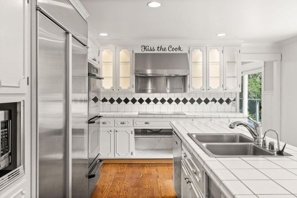 Interior, Kitchen, Recessed Lighting, Stainless Steel Appliances, Tile Countertops, Wood Texture Flooring