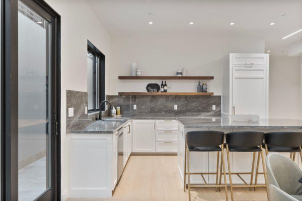 Interior, Kitchen, Recessed Lighting, Tile Countertops, Wood Texture Flooring