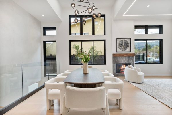 Dining room, Fireplace, Interior, Living room, Pendant Lights, Recessed Lighting, Wood Texture Flooring
