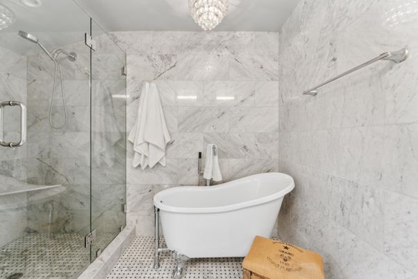 Bathroom, Chandelier, Free Standing Baths, Glass Shower, Interior, Marble Walls
