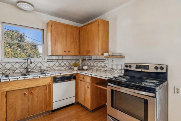 Interior, Kitchen, Tile Countertops, Wood Texture Flooring