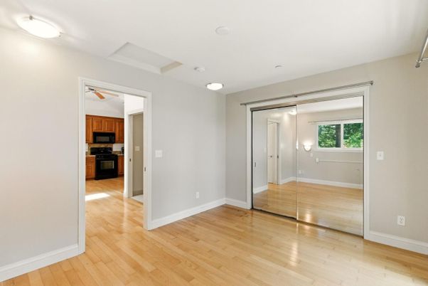 Empty room, Interior, Kitchen, Stainless Steel Appliances, Wood Texture Flooring