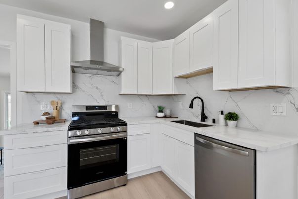 Interior, Kitchen, Marble Walls, Recessed Lighting, Stainless Steel Appliances, Wood Texture Flooring