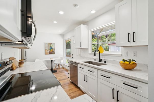 Dining room, Interior, Kitchen, Recessed Lighting, Stainless Steel Appliances, Wood Texture Flooring