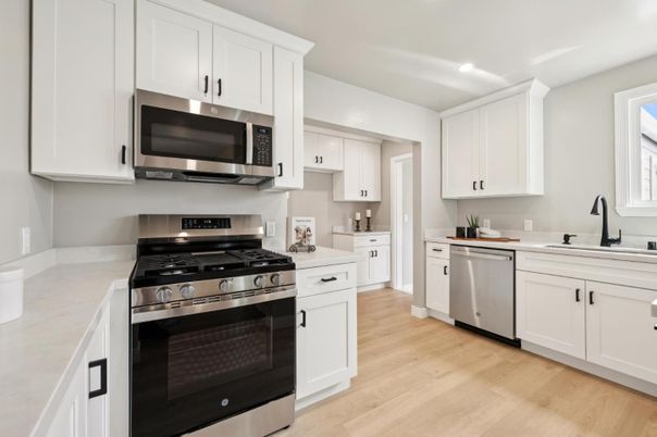 Interior, Kitchen, Recessed Lighting, Stainless Steel Appliances, Wood Texture Flooring