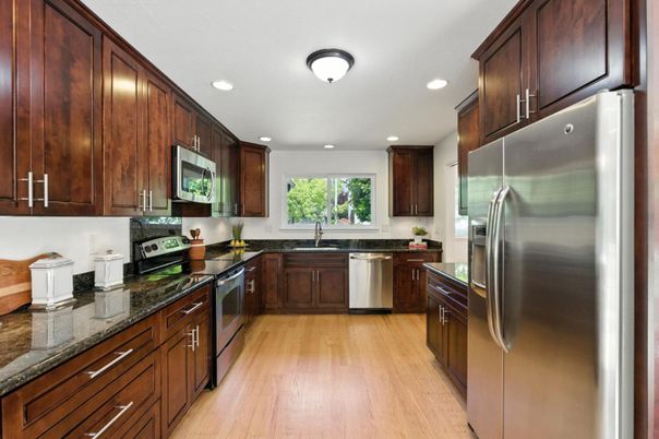 Interior, Kitchen, Recessed Lighting, Stainless Steel Appliances, Wood Texture Flooring