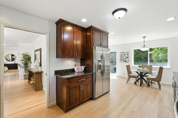 Dining room, Interior, Kitchen, Pendant Lights, Recessed Lighting, Stainless Steel Appliances, Wood Texture Flooring