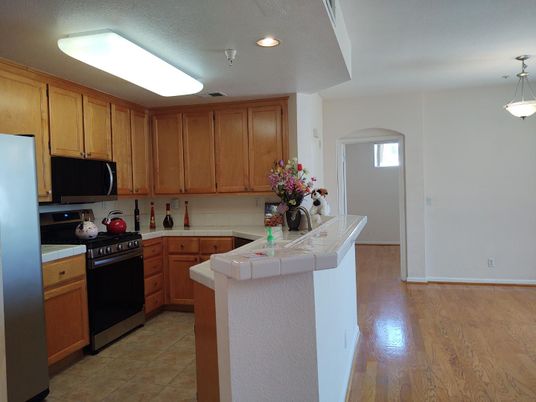 Interior, Kitchen, Pendant Lights, Recessed Lighting, Tile Countertops, Wood Texture Flooring