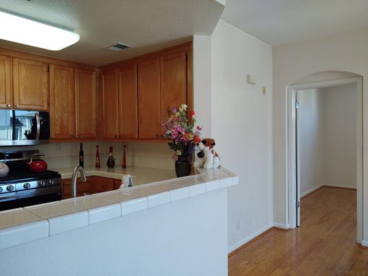 Interior, Kitchen, Tile Countertops, Wood Texture Flooring