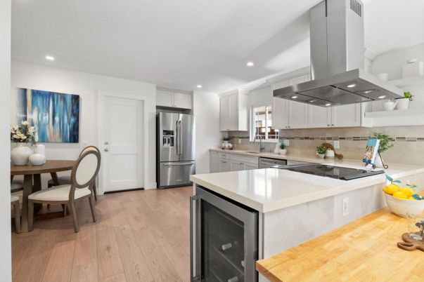 Dining room, Interior, Kitchen, Recessed Lighting, Stainless Steel Appliances, Wood Texture Flooring