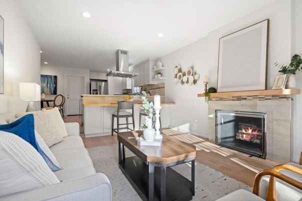 Fireplace, Interior, Kitchen, Living room, Recessed Lighting, Stainless Steel Appliances, Wood Texture Flooring
