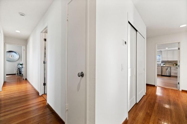 Interior, Kitchen, Recessed Lighting, Washer, Wood Texture Flooring