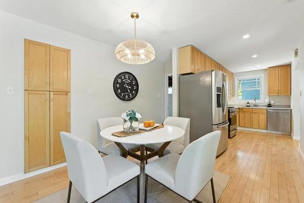 Dining room, Interior, Kitchen, Pendant Lights, Recessed Lighting, Stainless Steel Appliances, Wood Texture Flooring