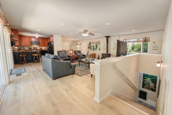 Fireplace, Interior, Kitchen, Living room, Recessed Lighting, Stone Walls, Wood Texture Flooring