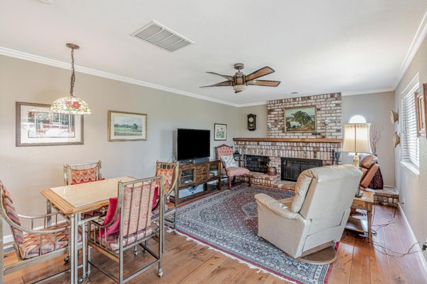 Dining room, Fireplace, Interior, Living room, Pendant Lights, Stone Walls, Wood Texture Flooring