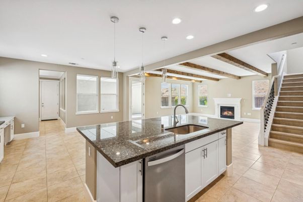 Fireplace, Interior, Kitchen, Pendant Lights, Recessed Lighting, Stainless Steel Appliances, Wooden Beams