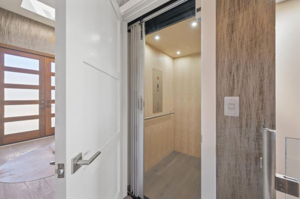 Elevator, Interior, Recessed Lighting, Wood Texture Flooring