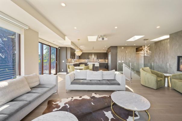 Chandelier, Dining room, Interior, Kitchen, Living room, Pendant Lights, Recessed Lighting, Stainless Steel Appliances, Wood Texture Flooring