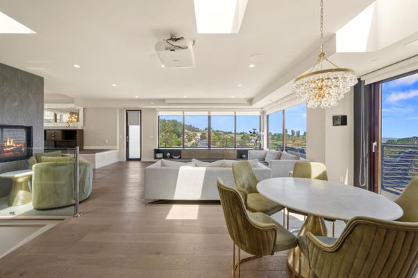 Chandelier, Dining room, Fireplace, Interior, Living room, Recessed Lighting, Wood Texture Flooring