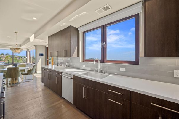 Chandelier, Dining room, Interior, Kitchen, Pendant Lights, Recessed Lighting, Stainless Steel Appliances, Wood Texture Flooring