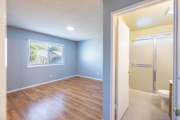 Bathroom, Empty room, Glass Shower, Interior, Recessed Lighting, Wood Texture Flooring