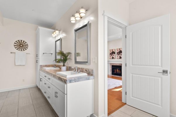 Bathroom, Dual Sink Vanities, Fireplace, Interior, Wood Texture Flooring
