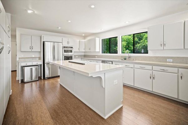 Interior, Kitchen, Recessed Lighting, Stainless Steel Appliances, Wood Texture Flooring