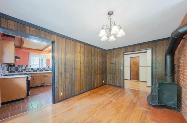 Chandelier, Empty room, Fireplace, Interior, Kitchen, Stone Walls, Wood Texture Flooring, Wooden Walls