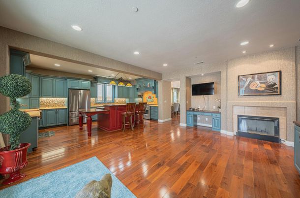 Fireplace, Interior, Kitchen, Recessed Lighting, Stainless Steel Appliances, Wood Texture Flooring