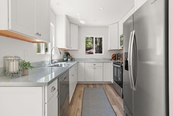 Interior, Kitchen, Recessed Lighting, Stainless Steel Appliances, Wood Texture Flooring