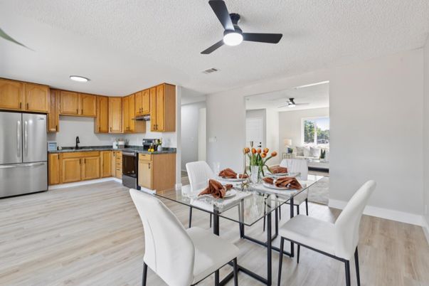 Dining room, Interior, Kitchen, Recessed Lighting, Stainless Steel Appliances, Wood Texture Flooring