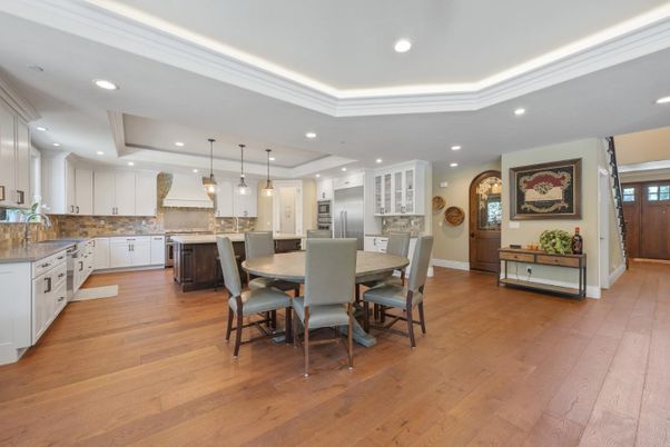 Dining room, Interior, Kitchen, Pendant Lights, Recessed Lighting, Stainless Steel Appliances, Wood Texture Flooring
