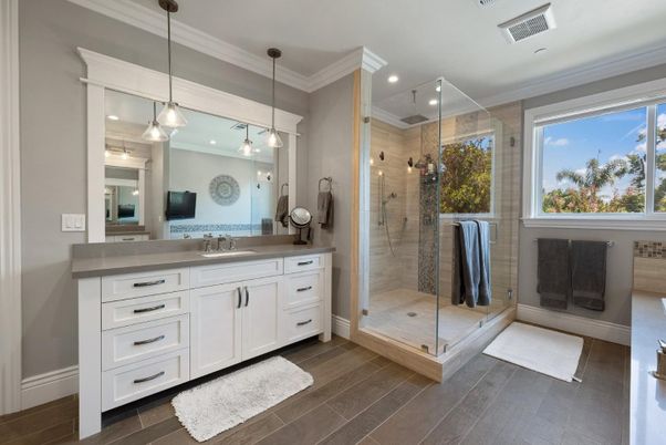 Bathroom, Glass Shower, Interior, Pendant Lights, Recessed Lighting, Wood Texture Flooring