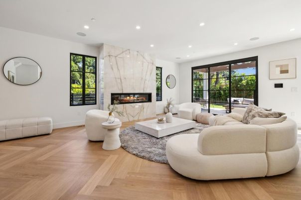 Fireplace, Interior, Living room, Marble Walls, Recessed Lighting, Wood Texture Flooring